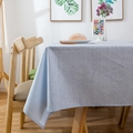Light blue linen textured waterproof rectangular tablecloth on a wooden table - Light Blue