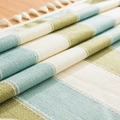 Macro detail of striped waterproof linen-blend tablecloth with decorative white fringe - 40cm X 40cm / Seat Cushion (Set of 2) / Blue and Green Stripes (Waterproof)