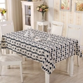 Detail of leaf pattern tablecloth on white dining table in cozy room setting - Small Square / Blue Leaves