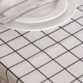 Mantel a cuadros blancos y negros con diseño nórdico minimalista en una mesa de comedor - 90x90cm / Cuadros Blancos