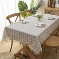 Modern minimalist black and white checkered tablecloth with white fringe on a wooden table - 60x60cm / White Plaid with Tassel