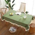 Modern minimalist green cotton tablecloth with cream ruffled edges in a cozy dining setting - 90x90cm / Green And Beige Ruffle