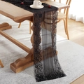 Elegant black lace table runner with hollow floral patterns on a rustic wooden table - 200cm / Black