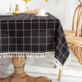 Rectangular black and white checkered tablecloth with decorative white cotton tassels - Black Grid With Tassels