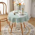Tovaglia rotonda impermeabile verde menta con nappe bianche per una sala da pranzo moderna - Stile Impermeabile Nappine / Verde petrolio
