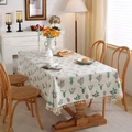 Mantel impermeable con estampado de cactus y borlas blancas en mesa comedor de madera - 140x260cm / Cactus (Borla)