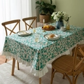 Floral cotton tablecloth with green leaf prints and white ruffled edges for dining room decor - Gradient Leaves Style