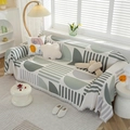 Nordic waffle textured sofa cover with geometric print and decorative fringe edges - 180x130 / Green Geometric