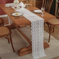 Elegant white French lace table runner with hollow floral pattern on a wooden dining table - 90CM Length / Arch Floral (30cm Wide)