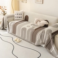 Nordic chenille sofa cover with brown geometric arch patterns and grey fringe trim - Phantom Dark Coffee