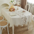 Beige floral embroidered tablecloth with decorative white tassel edges for home dining - Oval Embroidered Khaki Flower (Tassel)