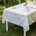 Nappe française en coton brodé de fleurs avec bordure à pompons blancs fins - 60x60 / Broderie Florale + Bordure à Pompons