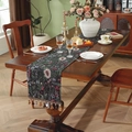 Retro floral jacquard table runner with decorative tassels on a vintage wooden dining table - 33*350cm / Yarn-dyed Black Floral With Coffee Tassels