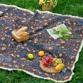 Detailed close-up of thickened woven picnic blanket with vintage floral bird patterns and tassels - Black Magpie + Dense Tassels