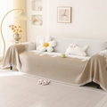 Copridivano in ciniglia nordica con motivi a onde color kaki e crema e frange decorative - 180x130cm / Piuma da Sogno Caffè