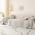 Nordic chenille sofa cover with grey geometric patterns and elegant decorative tassels - Phantom Light Gray
