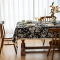 Bohemian black and white floral tablecloth with fringe edges on rectangular wood table - Black Floral with Dense Tassel