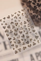 Nail stickers featuring leopard print heart patterns with gold borders, model MeYT7543 - Gold Gilding Leopard Heart (MeYT7543)