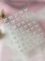 Iridescent 3D bow nail art stickers with pearlescent finish on transparent sheet - Jelly Shell Lake Blue (YT7215Pro)