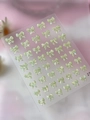 Iridescent laser green bow nail stickers for DIY manicure decoration on clear sheet - Jelly Shell Green (YT7220Pro)