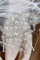 Elegant white pearlescent bow nail stickers with 3D embossed texture, model YT7644 - YT7644Te White