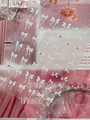 3D nail art stickers with white embossed bow designs and sparkling crystal accents - Rhinestone White (YT7753S)