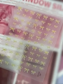 Autocollants nail art nœuds jaunes de tailles variées sur support YT7737 - Jaune