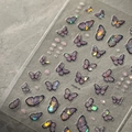 Macro detail of purple iridescent butterfly nail art stickers with laser holographic finish - YT3658 Shell Luster