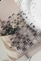 5D embossed nail stickers featuring black and white polka dot bows on translucent backing - YT7612Pm