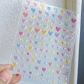 Close-up of macaron color 3D jelly heart nail stickers on transparent sheet - Heart Jelly Style (YT3858)