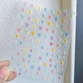 Macro shot of 3D jelly star nail stickers in pastel macaron colors on frosted backing - Star Jelly Style (YT3888)