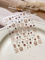 Cute cartoon rabbit nail stickers YT6952 in earthy tones on a white ceramic tray - Embossed YT6952
