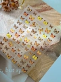 Nail art sticker YT7259 featuring realistic orange and black butterfly designs on light base - Relief Yt7259