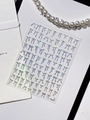 Macro shot of silver laser holographic bow nail stickers with pearl necklace decor - Silver Laser Bowknot (YT6257Ls)