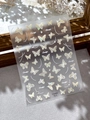 Macro shot of YT6083 holographic gold butterfly nail stickers with crystal accents - Gold Holographic Butterfly Style (YT6083)