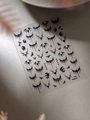 Detail of Halloween bat wing nail stickers with colorful pupils and crescent moon shapes - Jelly Silver Laser Bat Wings (YT6533Pro)