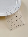 Detail of Starlit Sky nail stickers with black and gold stars on a white plate - Gold Bronzing Style (YT6418Me)
