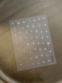 Detail of rose gold hexagram nail stickers with sparkling crystals on bronze tray - Rose Gold Style / Rose Gold