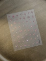 Detail of laser gold star nail stickers with rhinestones on transparent PET film - AB Color