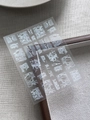 Detail of silver ripped lace nail art stickers with modern distressed fabric texture - Silver White Distressed Denim Texture (YT6382Pm)