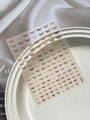 Embossed colorful bow nail art stickers with YT6241 code on elegant background - Relief YT6241