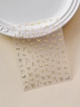 Detailed macro view of golden bow nail art stickers with metallic reflective texture - Gold Style Bow (YT5505Hj)
