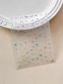 Detailed view of blue and white bow nail art stickers on a transparent sheet - Blue Style Bow (YT5504Pm)