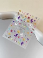 Close-up of colorful Halloween nail art stickers with pumpkin, ghost and candy designs - Crystal Jelly Shell Glow (YT6672ProS)