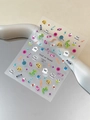 Detail shot of colorful Halloween nail art stickers with pumpkin and ghost motifs - Flat Style (YT6673Pm)