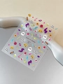 Close-up of Halloween nail stickers with ghosts and pumpkins on a grey tray - Flat Style (YT6671Pm)