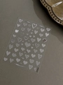 Embossed silver heart nail stickers with striped and dotted patterns on a sheet - Bronzing Silver YT6725Si