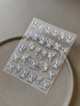 Detail shot of holographic butterfly nail art stickers with metallic silver outlines - Starlight Silver Laser (YT6740Pro)