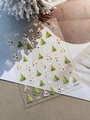 Detailed macro of 3D embossed Christmas tree nail stickers with bows on YT6569 sheet - Relief Green Christmas Tree (YT6569)