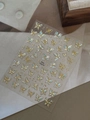 Detailed view of YT6374 gold embossed butterfly nail stickers with pearlescent texture - Bronzing Starlight Film / Blue (YT6374)